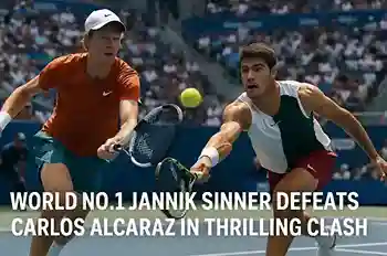 Jannik Sinner pumps his fist after victory over Carlos Alcaraz on the tennis court